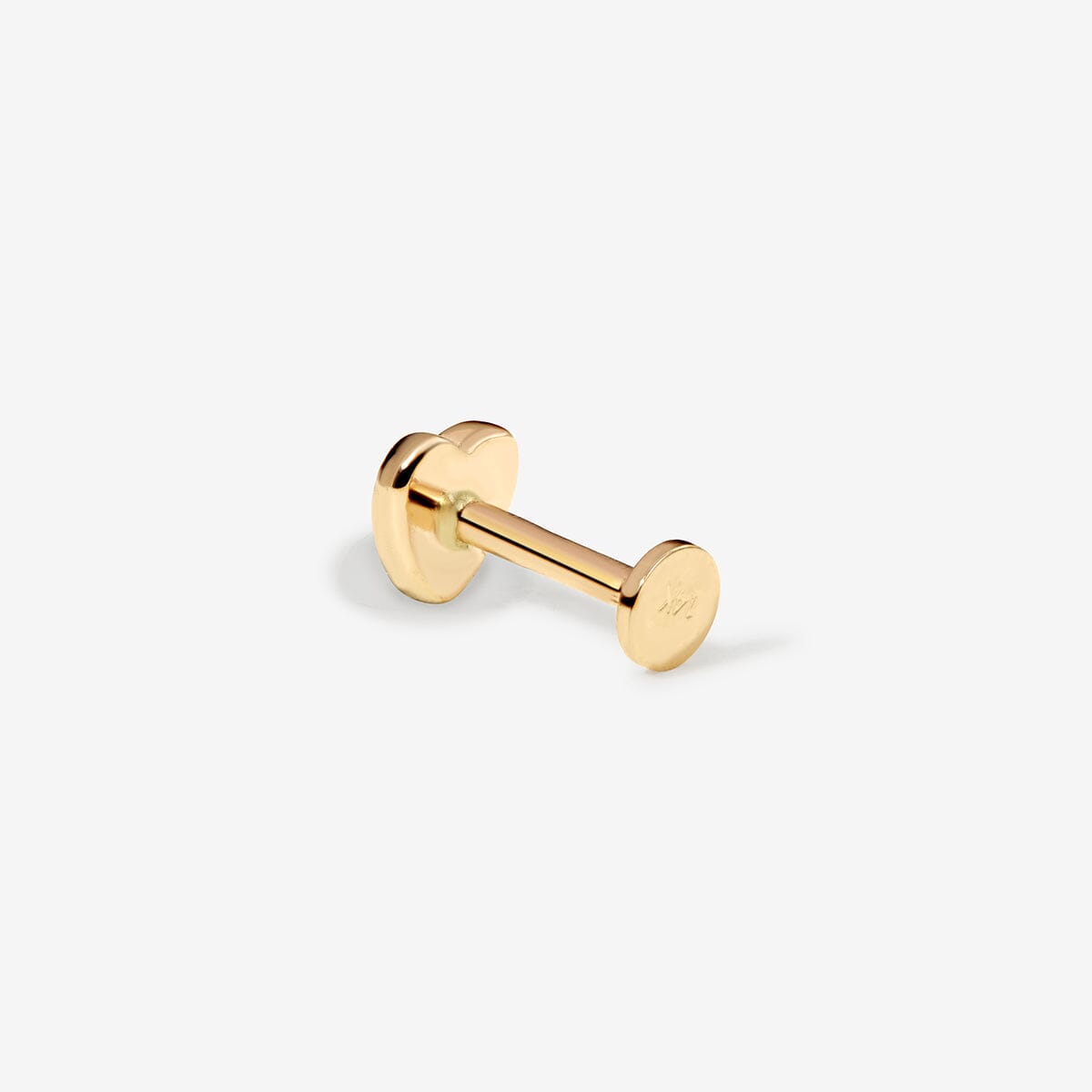 Saint pink heart piercing