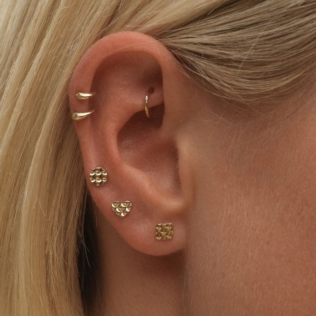 Taylor square quilted piercing